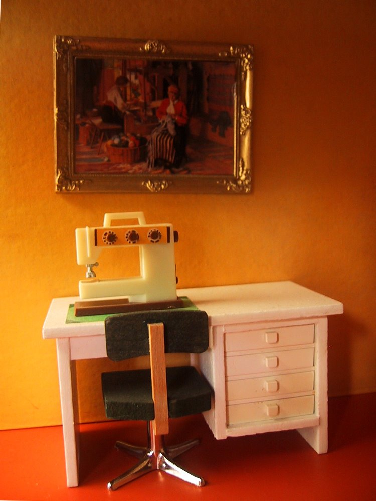 Vintage Lundby dolls' house desk with sewing machine on top.