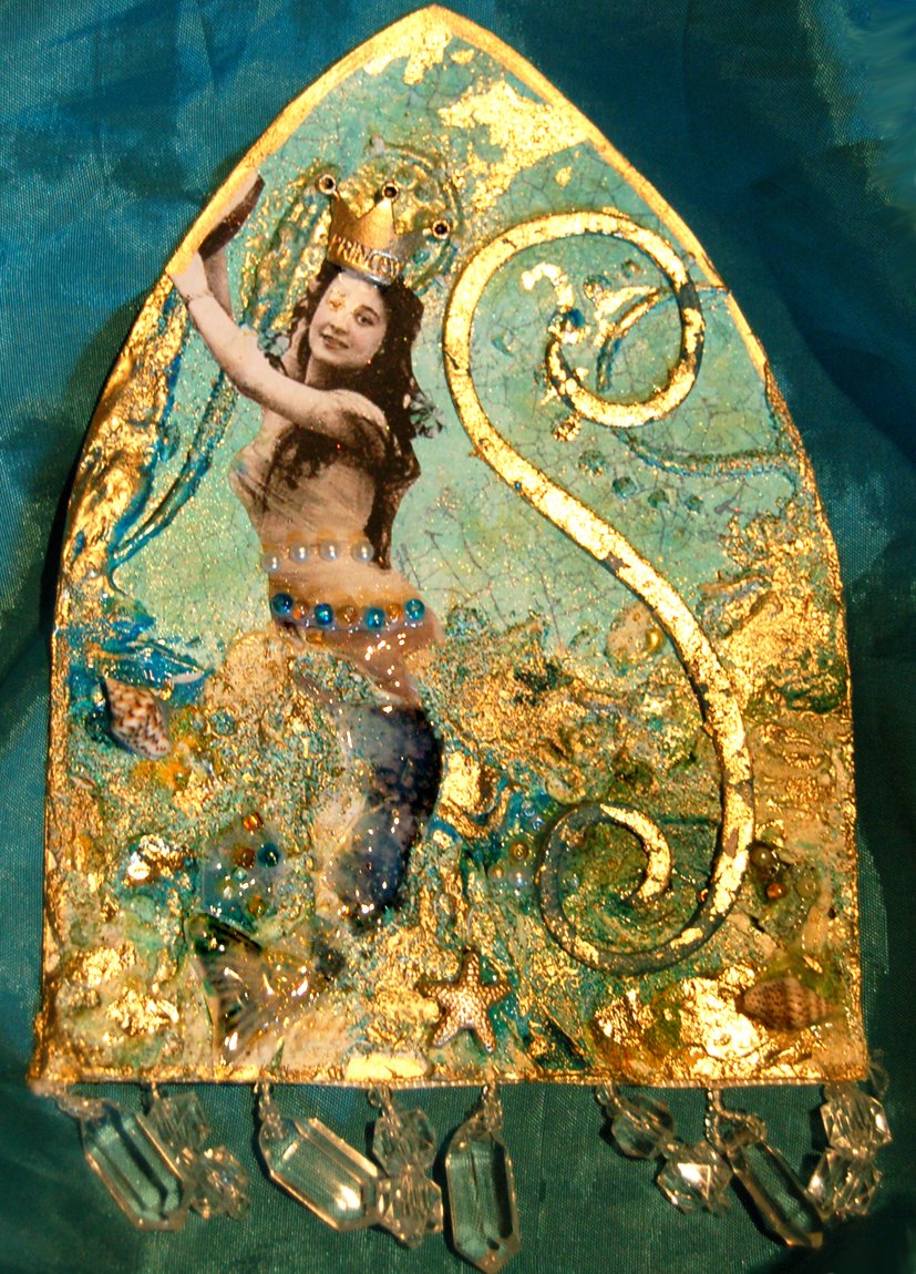 [mermaid+gold.jpg]