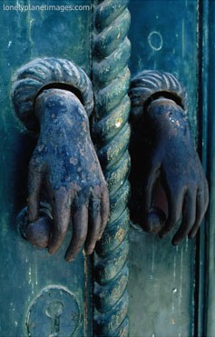 [Metal-Hand-Doorknockers-Decorate-a-Door-in-Tavira-Tavira-Algarve-Portugal-Posters.jpg]