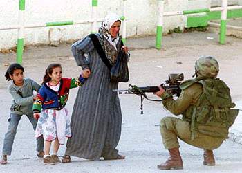 [Palestianian+family+stopped+by+IDF+soldier.JPG]