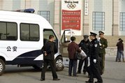 [Chinese+Arrests.jpg]