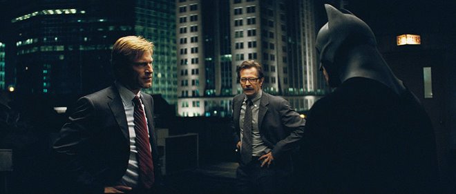 The Dark Knight - Aaron Eckhart as Harvey Dent, Gary Oldman as Lt. James Gordon and Christian Bale as Batman