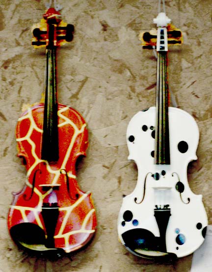 [giraffe-dalmation+violins.jpg]