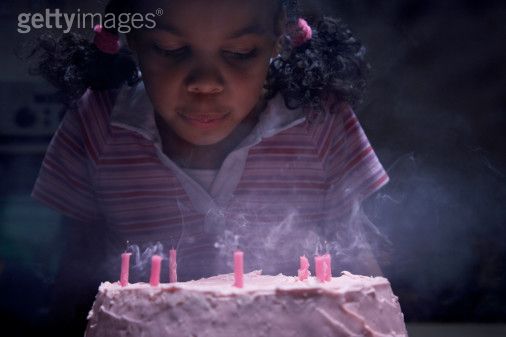 [Girl+blowing+out+candles+on+pink+birthday+cake+-+Sean+Justice.jpg]