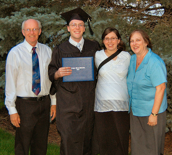 [Rob+and+Kendra+with+Mom+and+Dad+after+grad.jpg]