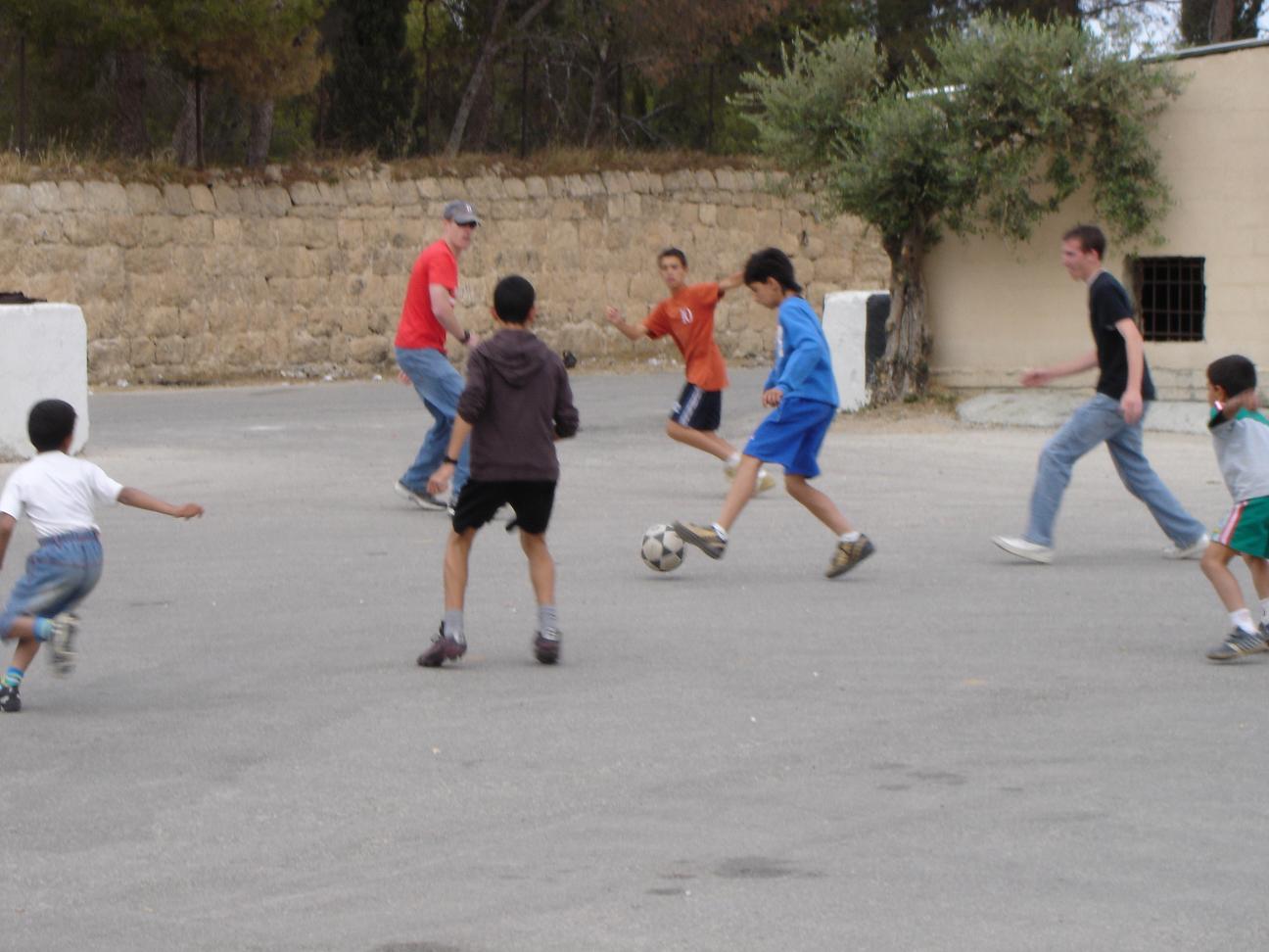 [Playing+soccer+with+Palestinian+kids+in+Bethlehem.JPG]