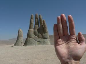 [204316-Two-hands-in-the-desert-0.jpg]