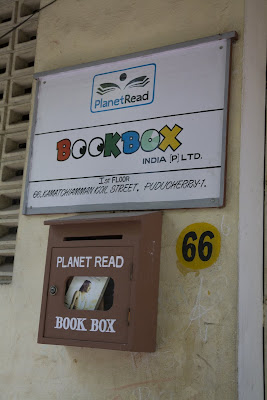 Door signs for Planet Read and Boobbox