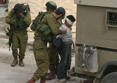 [Israeli+kidnapping+palestinian+child.jpg]