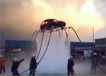 [Fire-Fighters-lift-car-with-water.jpg]