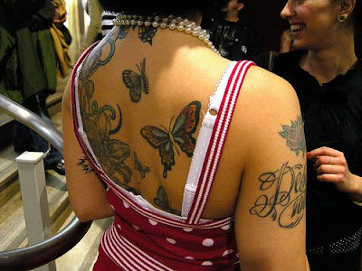 sexy girl with butterfly tattoo