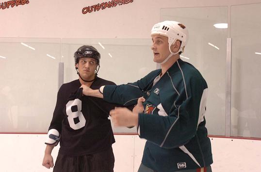 Aaron (black jersey), left and Derek (green jersey) Boogaard, right at hockey fight camp