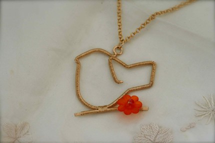 [bird+and+flower+necklace+closer+up.jpg]