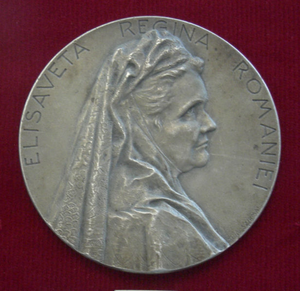 [617px-Queen_Elisabeth_of_Romania_medal.jpg]