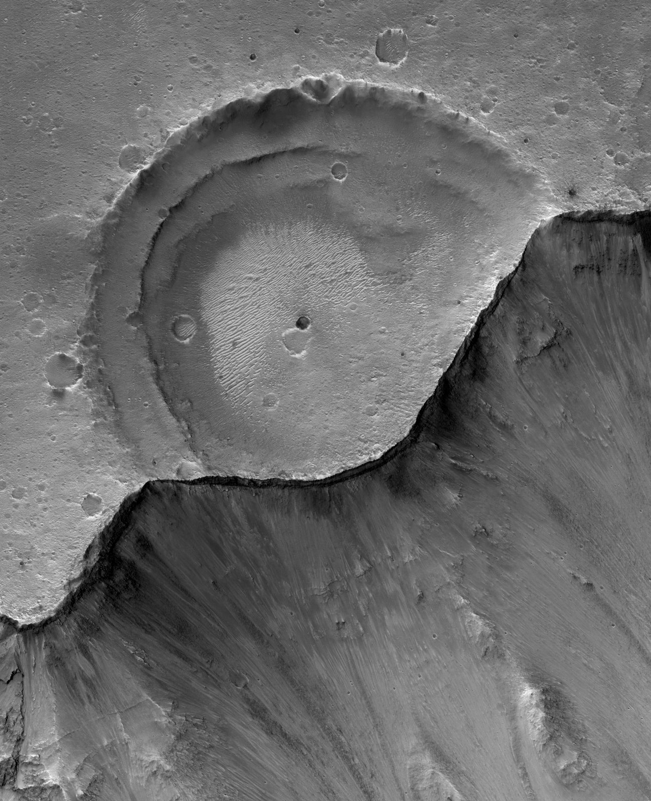 [Impact+Crater+Cut+by+Ganges+Chasma+PSP_005543_1725.jpg]