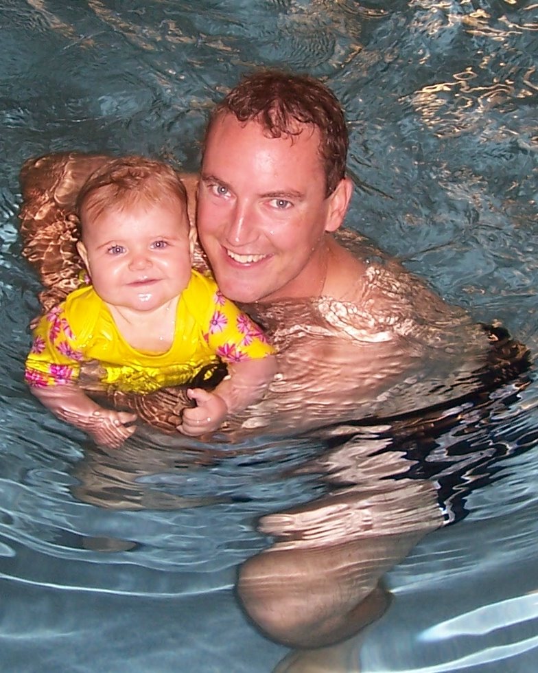 [daddy+and+tessa+swimming.JPG]