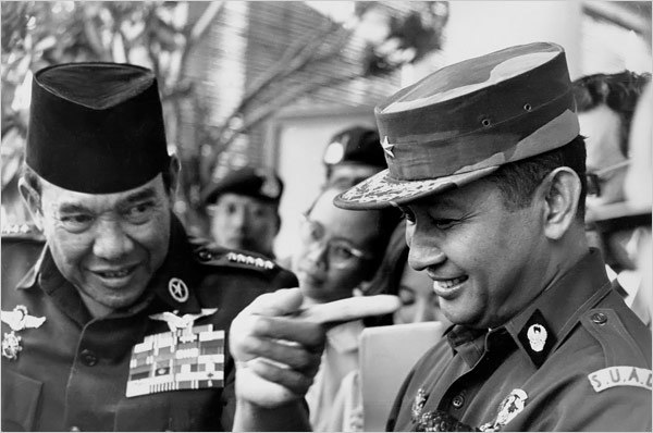 [Like+his+predecessor+Sukarno,+left,+Mr.+Suharto,+right,+worked+to+forge+national+unity+in+a+fractious+country+of+200+million+people+comprising+300+ethnic+groups+speaking+250+languages.JPG]