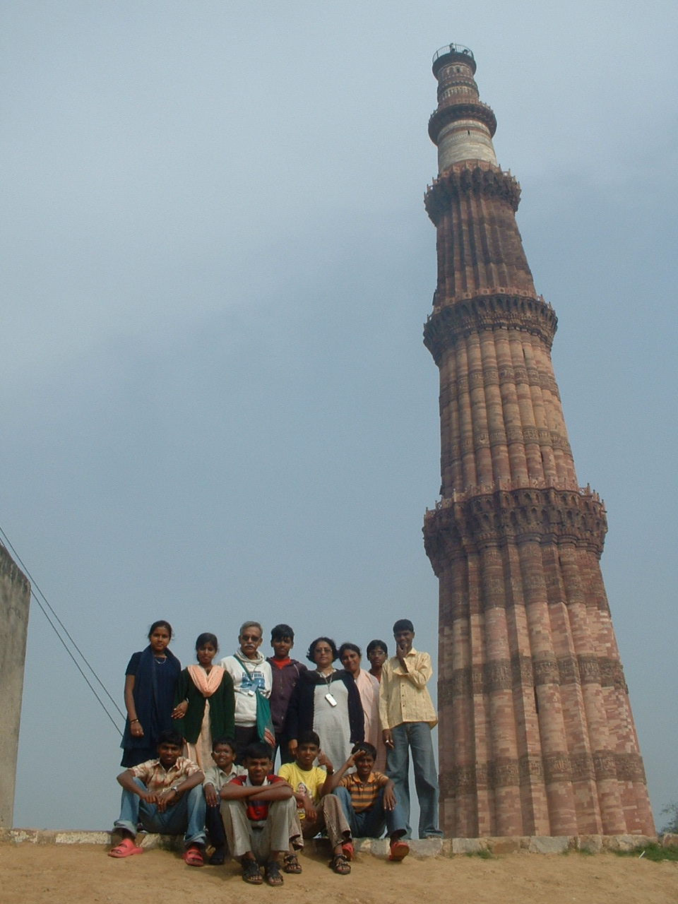 [dwarfed+by+the+qutub+Minar,+Delhi.JPG]