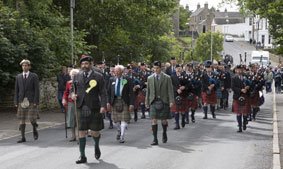 [The+Scots+Guards+Association+Pipe+Band+marching+to+Halkirk+Highland+Games+on+Saturday,+led+by+games+chieftan+John+Thurso.jpg]