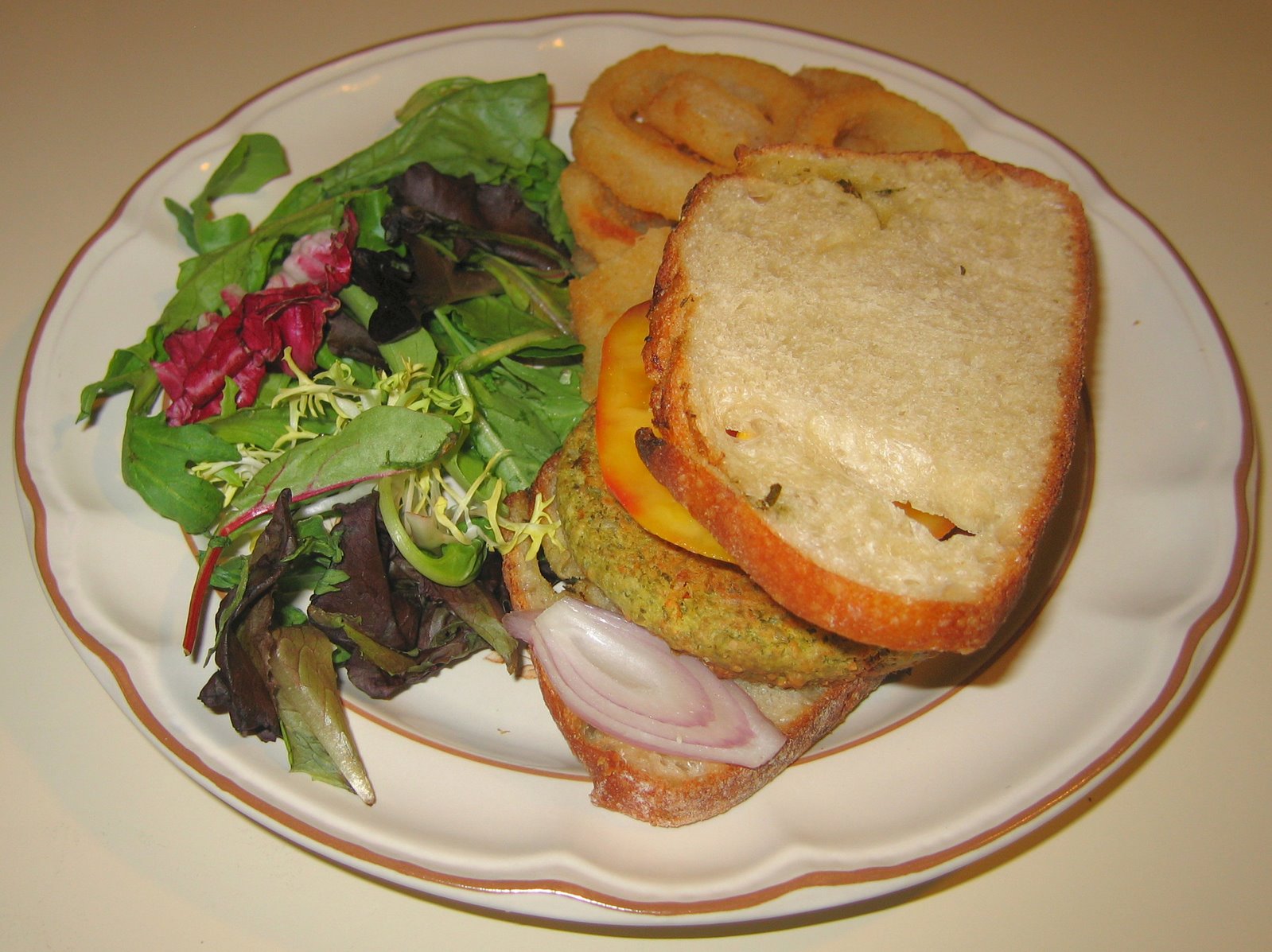 [20071205+Garden+Herb+Organic+Sunshine+Burger+on+Lemon+Rosemary+Bread,+Onion+Rings.jpg]