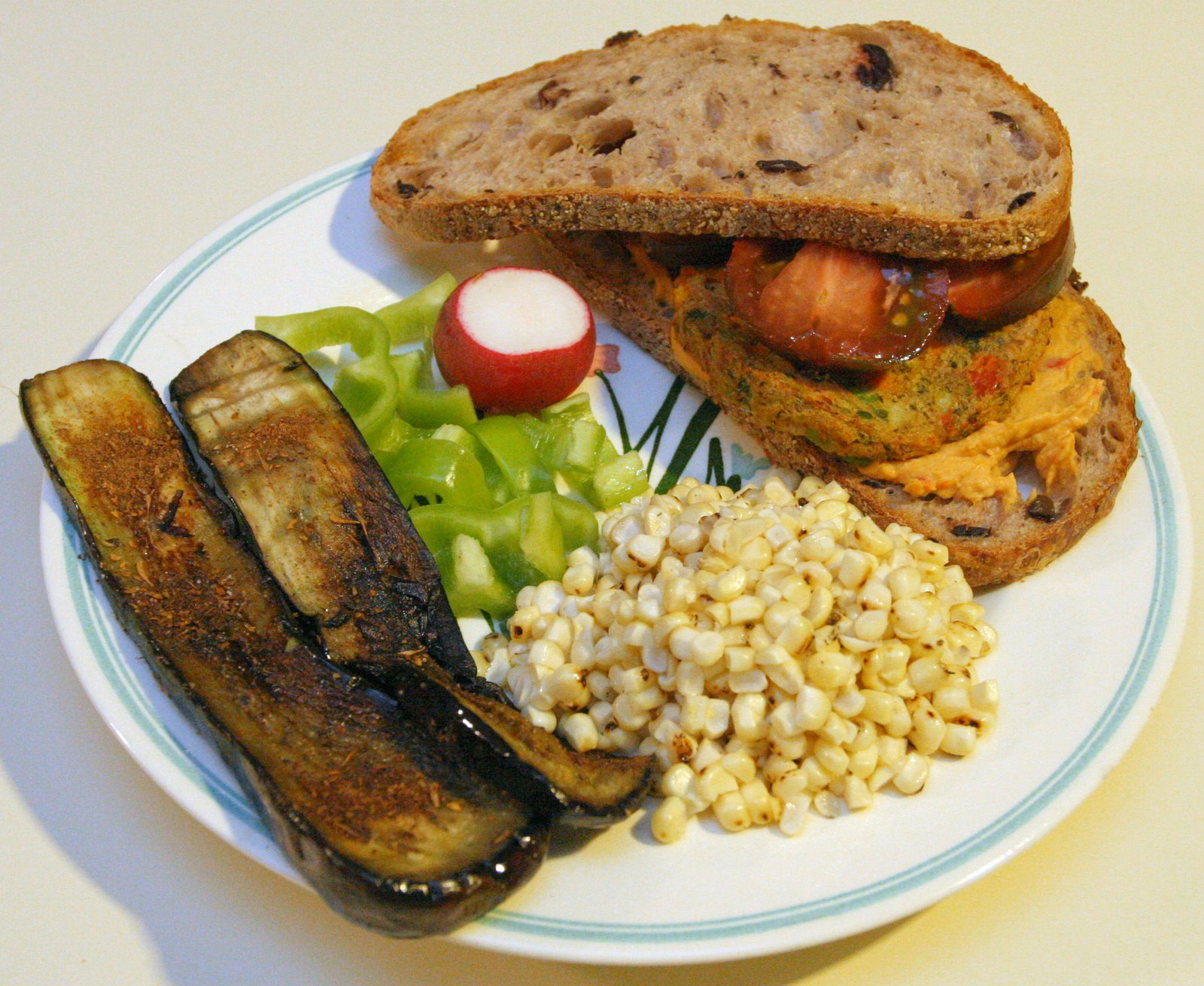 [20071111+California+Veggie+Burger+on+Hummus+and+Olive+Bread+w+Jerk-Seasoned+Eggplant+&+Lime+Corn.jpg]