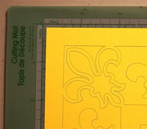 [offset+top+left+of+yellow+fleur+de+lis+frame+to+get+even+outer+edges.jpg]