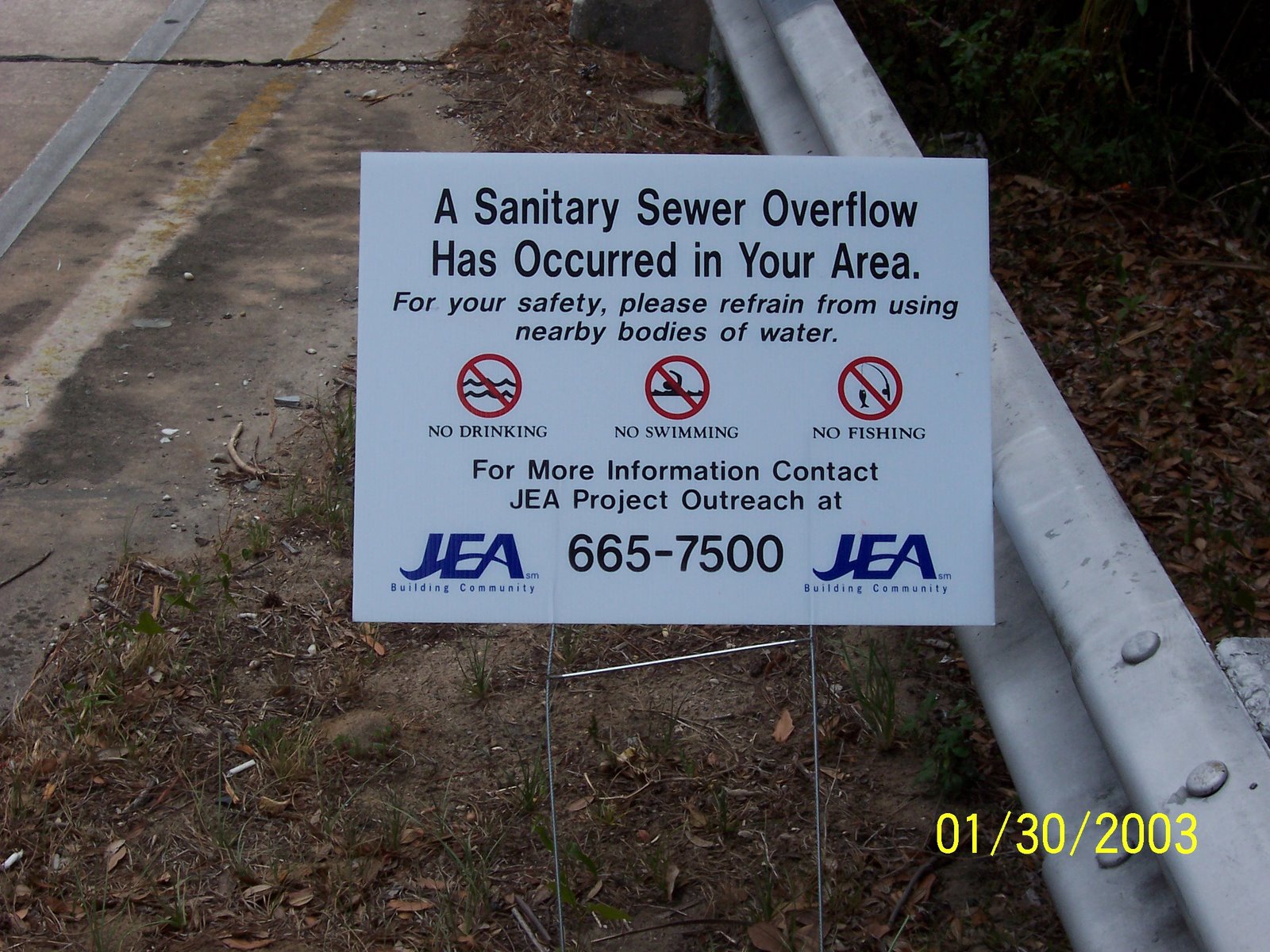 [sewer+overflow+sign.JPG]