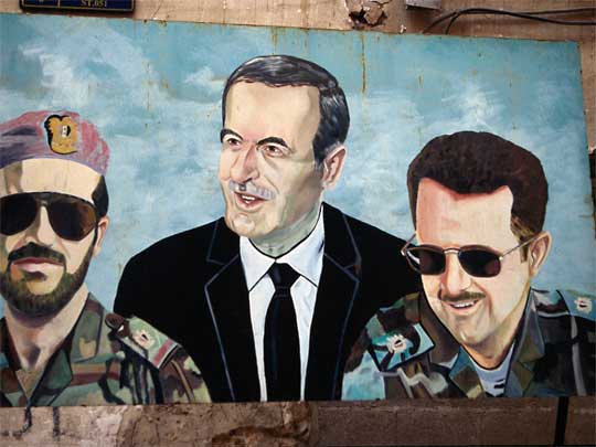 [Mural+of+former+president+Assad+and+his+sons;+Bashir,+on+right,+is+now+president+siria.jpg]