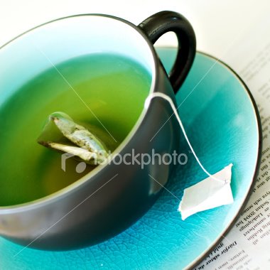 [ist2_4128612_cup_of_green_tea.jpg]
