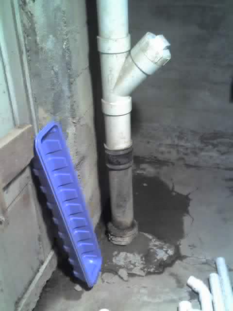 The secondary sewage line cleanout in the basement.  This is one of three lines that go from the house, to the street.  Why there are three, I do not know, but I am very glad that the house is compartmentalized into three sections.