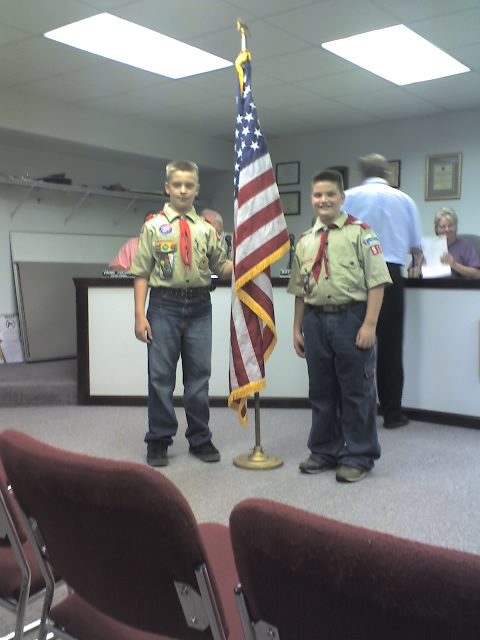 Richard and William Presenting the flag at the New Richmond Village Council Meeting