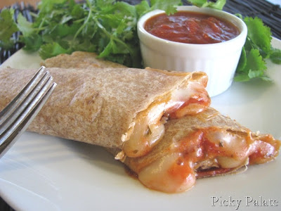 Pizza Roll Ups on a plate.
