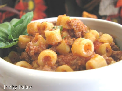 A bowl of Ditalini pasta in beef and fennel ragu.